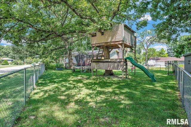 1536 Hickory Point Rd, Metamora, IL 61548 - fenced backyard featuring a playground