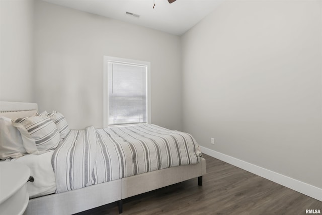 4096 Oak Run Dr, Dahinda, IL 61428 - bedroom featuring dark wood-type flooring and a ceiling fan