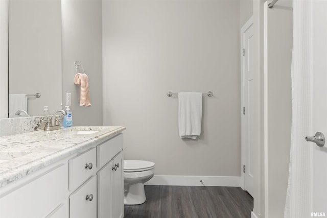 4096 Oak Run Dr, Dahinda, IL 61428 - bathroom featuring wood finished floors and double vanity
