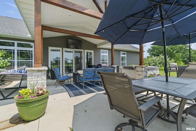 4096 Oak Run Dr, Dahinda, IL 61428 - view of patio featuring outdoor dining space and outdoor lounge area