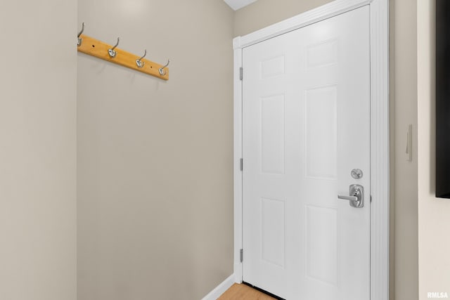 123 SW Jefferson St Unit E10C, Peoria, IL 61602 - doorway to outside featuring baseboards