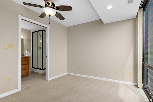 123 SW Jefferson St Unit E10C, Peoria, IL 61602 - unfurnished bedroom featuring light colored carpet, ensuite bath, ceiling fan, and recessed lighting