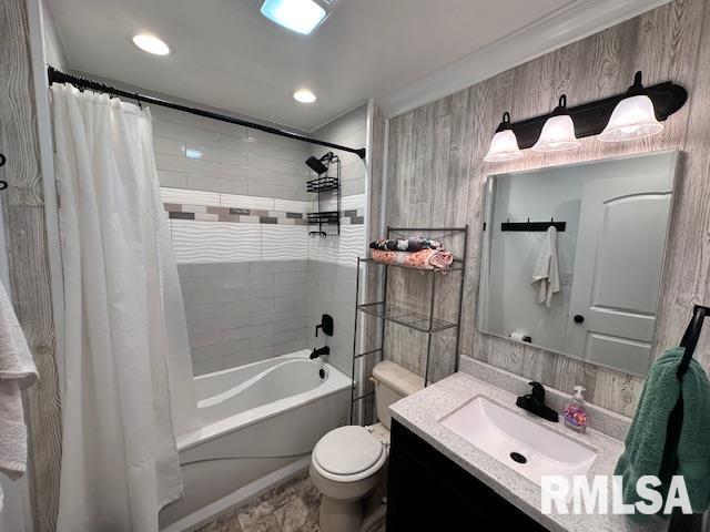 964 E Locust St, Canton, IL 61520 - bathroom featuring vanity, shower / bathtub combination with curtain, and recessed lighting
