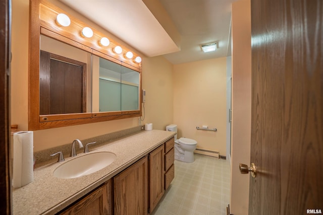 748 E Poplet Hollow Rd, Peoria, IL 61614 - full bathroom with tile patterned floors, vanity, and baseboard heating
