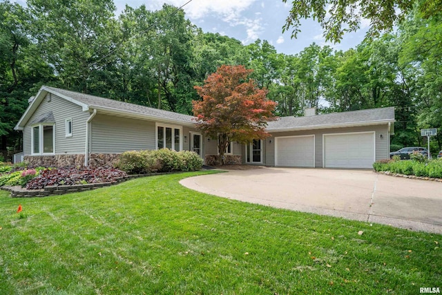 748 E Poplet Hollow Rd, Peoria, IL 61614 - ranch-style house with an attached garage, driveway, a front yard, a chimney, and stone siding