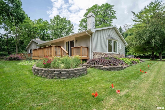 748 E Poplet Hollow Rd, Peoria, IL 61614 - view of side of home featuring stone siding, a wooden deck, a chimney, and a yard