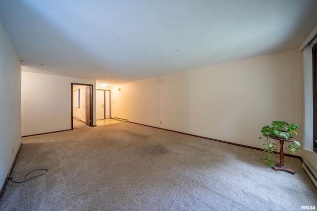 748 E Poplet Hollow Rd, Peoria, IL 61614 - unfurnished room with carpet floors and a baseboard heating unit