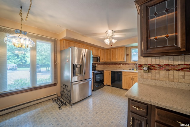 748 E Poplet Hollow Rd, Peoria, IL 61614 - kitchen with black appliances, baseboard heating, tasteful backsplash, decorative light fixtures, and a chandelier