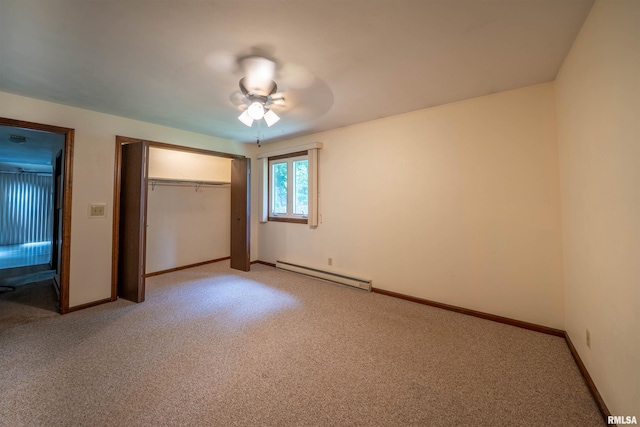 748 E Poplet Hollow Rd, Peoria, IL 61614 - unfurnished bedroom featuring a baseboard radiator, light colored carpet, a closet, and ceiling fan