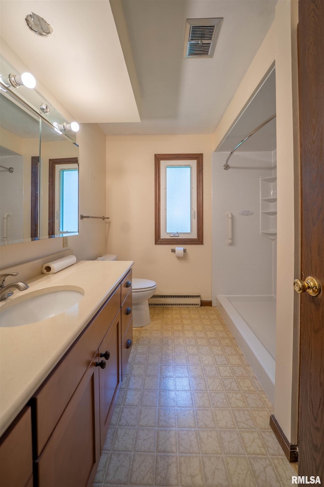 748 E Poplet Hollow Rd, Peoria, IL 61614 - bathroom featuring a baseboard heating unit, vanity, tile patterned floors, and shower / tub combination
