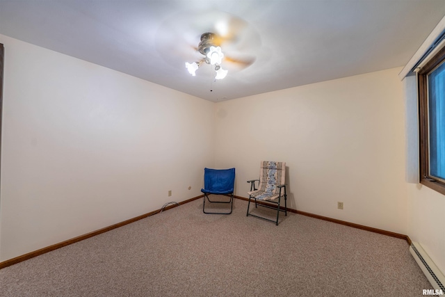 748 E Poplet Hollow Rd, Peoria, IL 61614 - unfurnished room with a baseboard radiator, carpet flooring, and ceiling fan