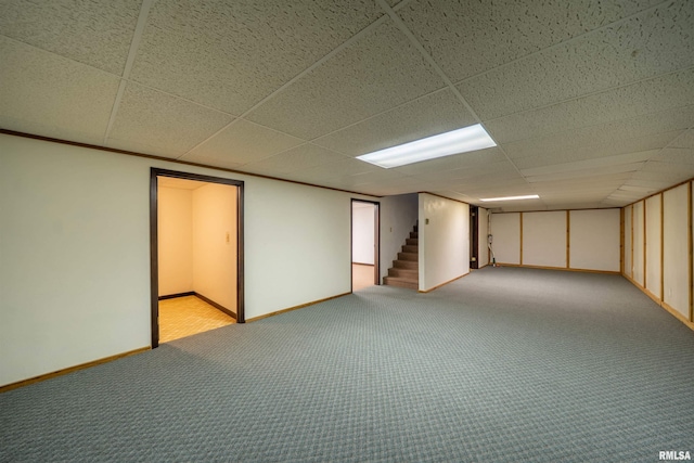 748 E Poplet Hollow Rd, Peoria, IL 61614 - finished basement with a drop ceiling, carpet, and stairway