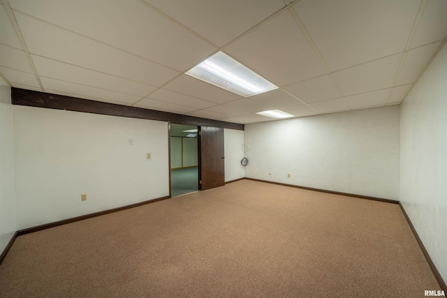 748 E Poplet Hollow Rd, Peoria, IL 61614 - carpeted empty room with a drop ceiling and baseboards