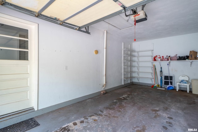 748 E Poplet Hollow Rd, Peoria, IL 61614 - garage featuring a garage door opener