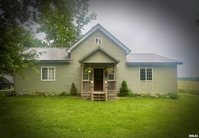 442 W Oak St, Smithfield, IL 61477 - back of house with a lawn, a metal roof, and a porch