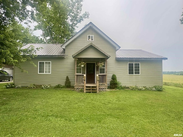 442 W Oak St, Smithfield, IL 61477 - back of house featuring a lawn, a metal roof, and a porch