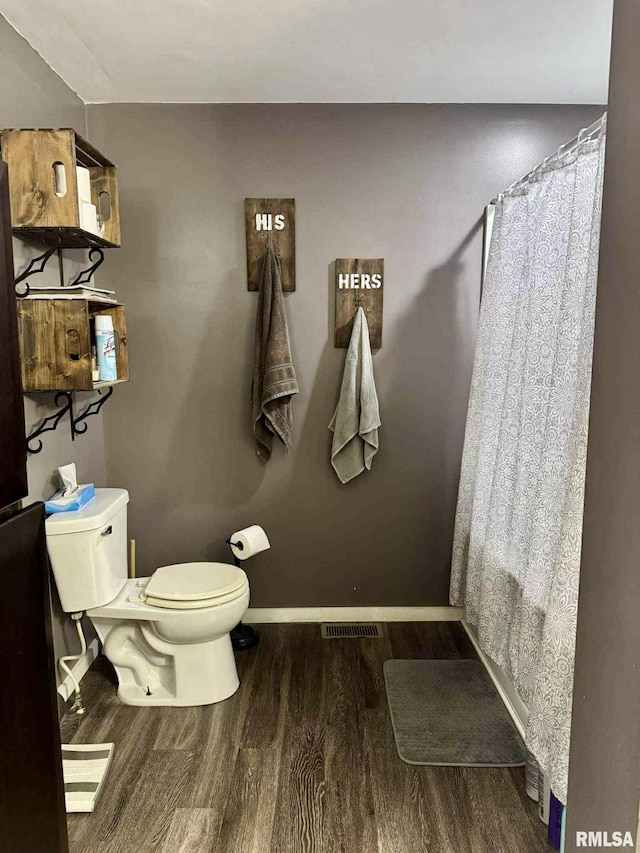 442 W Oak St, Smithfield, IL 61477 - bathroom with wood finished floors and curtained shower