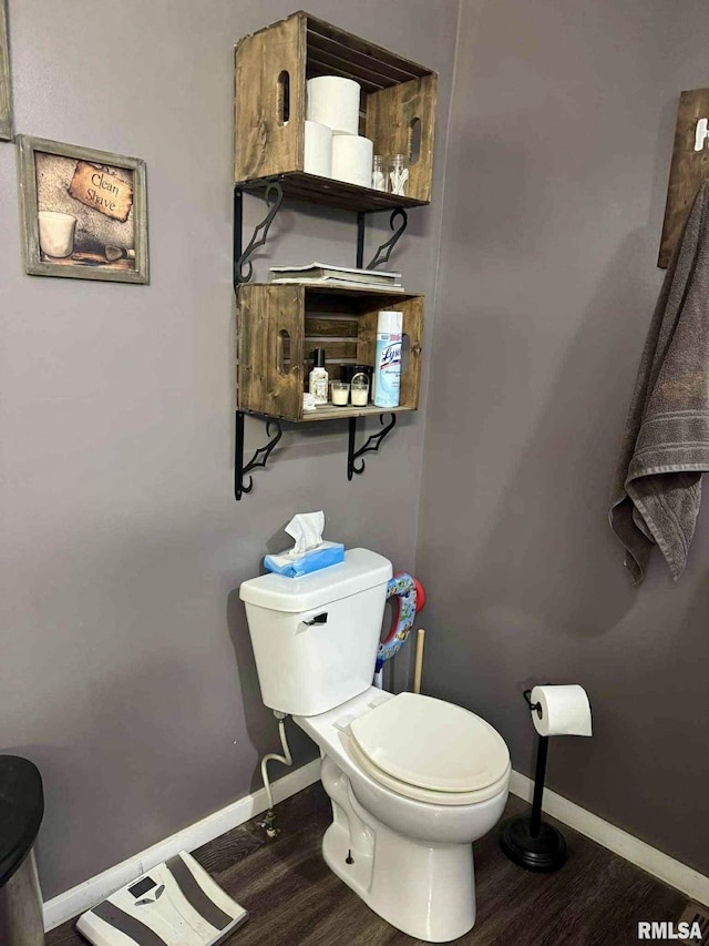 442 W Oak St, Smithfield, IL 61477 - half bath featuring toilet and wood finished floors