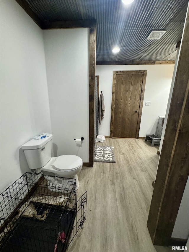 442 W Oak St, Smithfield, IL 61477 - bathroom with toilet and wood finished floors
