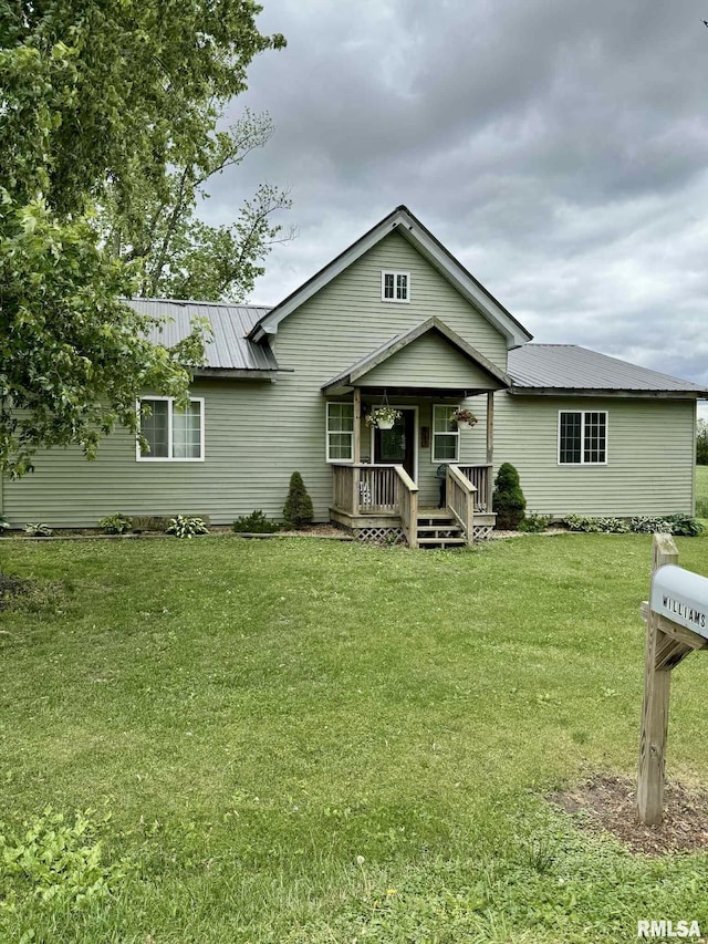 442 W Oak St, Smithfield, IL 61477 - view of front of property with a metal roof, a porch, and a front yard