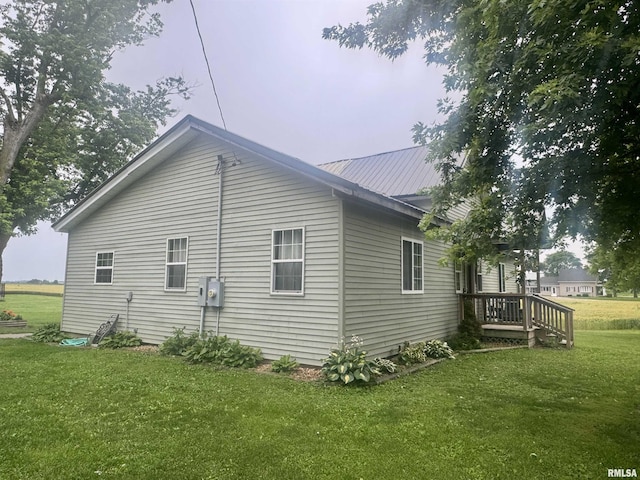 442 W Oak St, Smithfield, IL 61477 - view of side of property featuring a yard and a metal roof