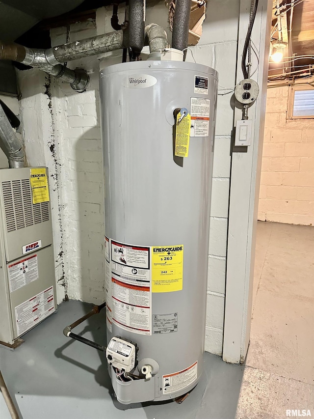 904 E Forrest Hill Ave, Peoria, IL 61603 - utility room featuring gas water heater