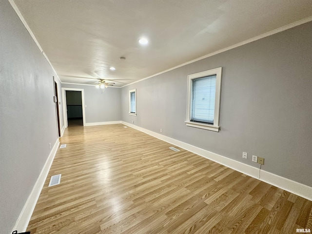 904 E Forrest Hill Ave, Peoria, IL 61603 - unfurnished room featuring ornamental molding, light wood finished floors, a ceiling fan, and recessed lighting