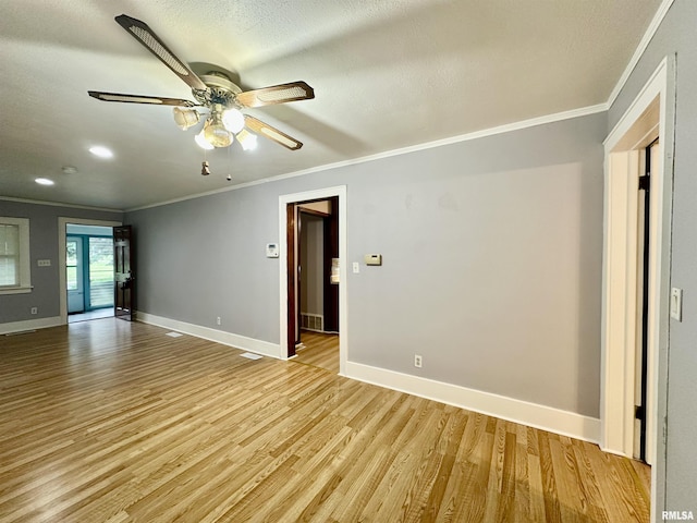904 E Forrest Hill Ave, Peoria, IL 61603 - empty room featuring ornamental molding, light wood finished floors, ceiling fan, and recessed lighting