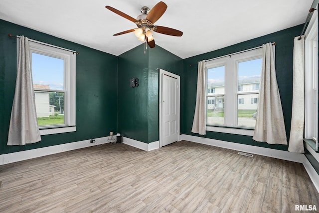411 E 3rd St, Delavan, IL 61550 - unfurnished room with a ceiling fan and wood finished floors