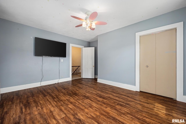 411 E 3rd St, Delavan, IL 61550 - unfurnished bedroom with wood finished floors and ceiling fan