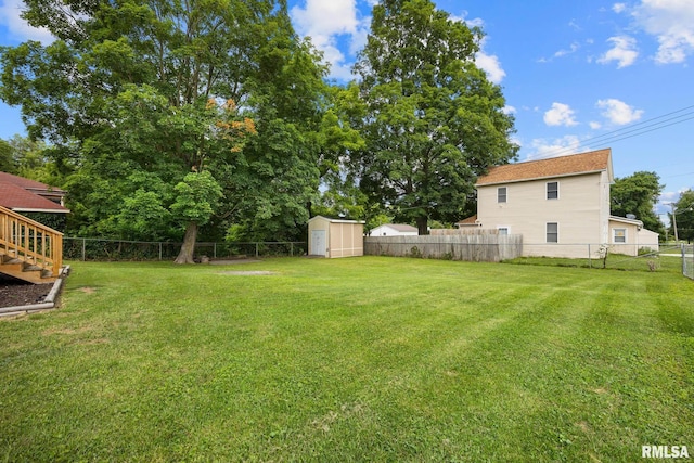 411 E 3rd St, Delavan, IL 61550 - fenced backyard featuring a storage shed