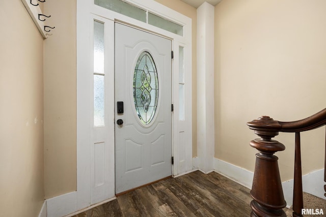 411 E 3rd St, Delavan, IL 61550 - foyer entrance with dark wood finished floors and stairs