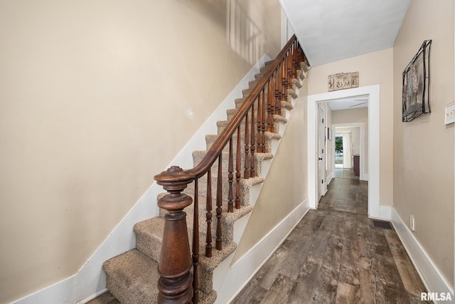 411 E 3rd St, Delavan, IL 61550 - stairs with wood finished floors and baseboards