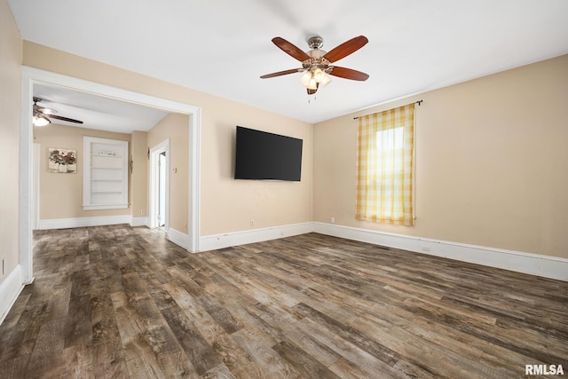 411 E 3rd St, Delavan, IL 61550 - unfurnished room with ceiling fan and wood finished floors