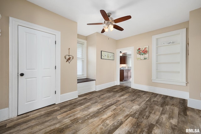 411 E 3rd St, Delavan, IL 61550 - interior space with a ceiling fan, wood finished floors, and built in features