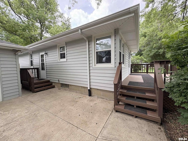505 S Davenport St, Metamora, IL 61548 - rear view of house with a patio area and a deck