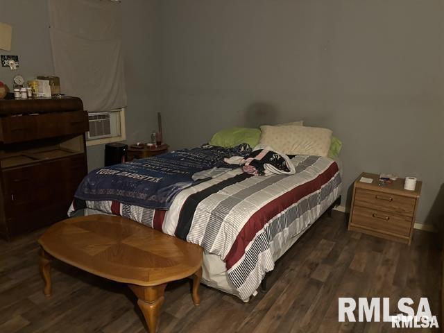 1608 S Lydia Ave, Peoria, IL 61605 - bedroom with wood finished floors and cooling unit