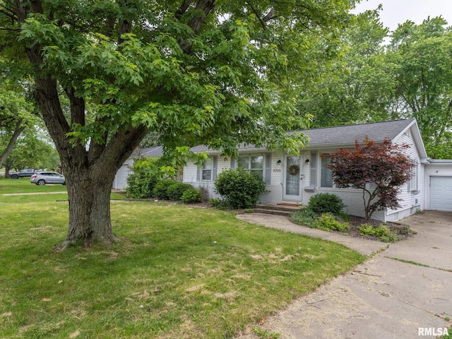 2705 N Victoria Ave, Peoria, IL 61604 - view of front facade with an attached garage, a front yard, concrete driveway, and roof with shingles