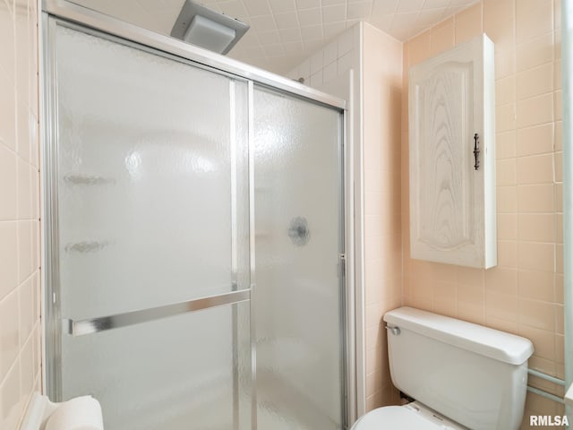 2705 N Victoria Ave, Peoria, IL 61604 - bathroom with tile walls and a shower stall
