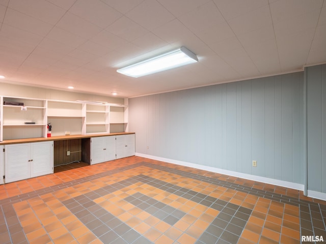 2705 N Victoria Ave, Peoria, IL 61604 - below grade area featuring built in study area and tile patterned floors