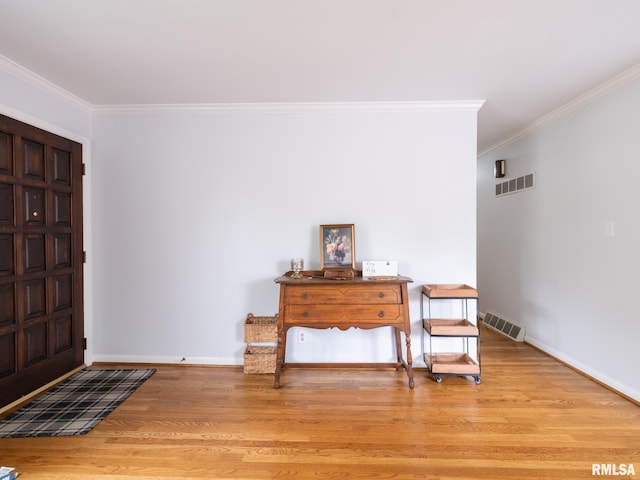 2705 N Victoria Ave, Peoria, IL 61604 - entrance foyer with ornamental molding and light wood-type flooring