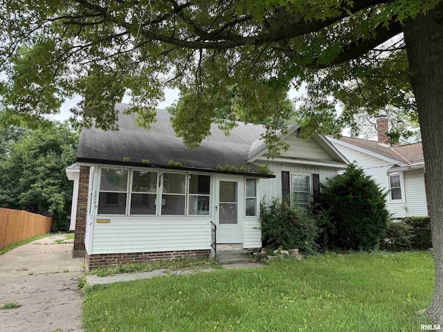 1210 W Macqueen Ave, Peoria, IL 61604 - view of front facade with entry steps and roof with shingles