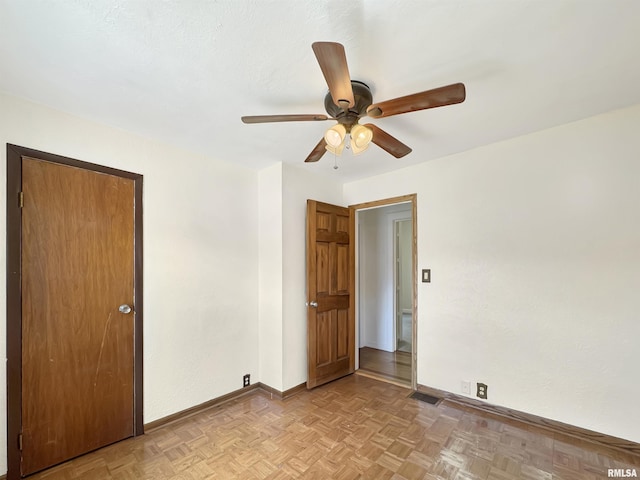 510 W Willcox Ave, Peoria, IL 61604 - empty room featuring baseboards and a ceiling fan