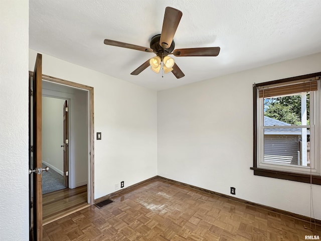 510 W Willcox Ave, Peoria, IL 61604 - unfurnished room with ceiling fan and a textured ceiling