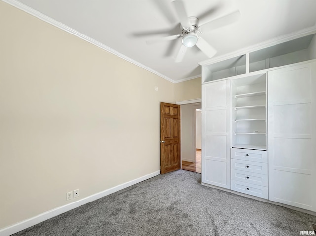 510 W Willcox Ave, Peoria, IL 61604 - unfurnished bedroom featuring ornamental molding, carpet floors, and a ceiling fan