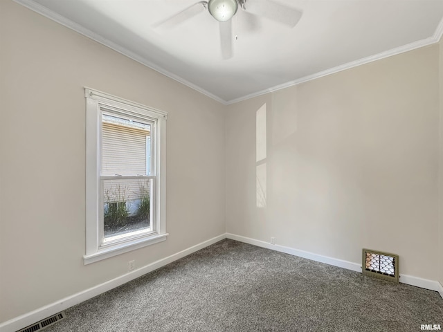 510 W Willcox Ave, Peoria, IL 61604 - spare room featuring carpet floors, plenty of natural light, ceiling fan, and ornamental molding