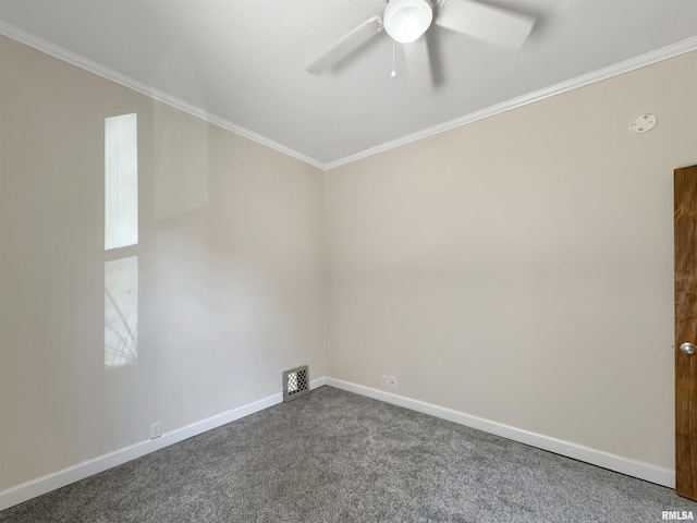 510 W Willcox Ave, Peoria, IL 61604 - unfurnished room with ceiling fan, dark carpet, and ornamental molding