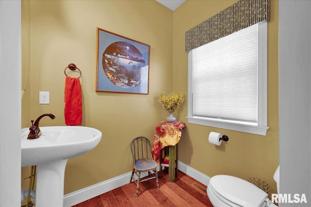 1712 Rustic Oak Dr, Washington, IL 61571 - bathroom featuring wood finished floors and toilet