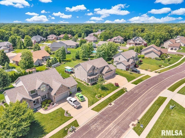 1712 Rustic Oak Dr, Washington, IL 61571 - aerial view of residential area featuring a forest