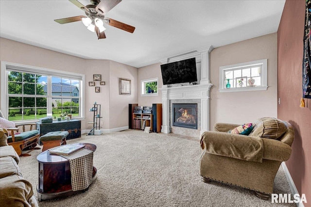 1712 Rustic Oak Dr, Washington, IL 61571 - carpeted living room featuring a fireplace and ceiling fan